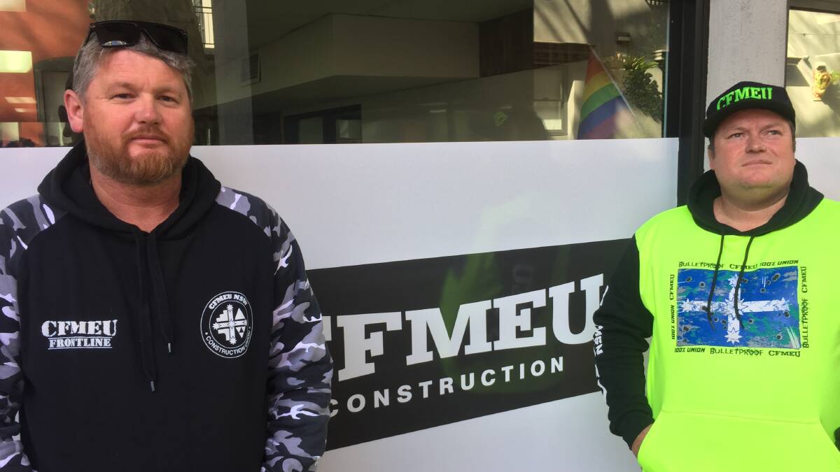 CFMEU organisers Brendan Holl and Mark Cross, outside the Hunter Workers building in Newcastle on Tuesday.