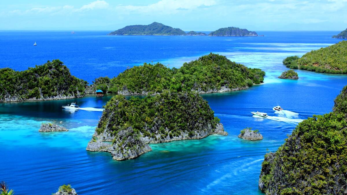 The Raja Ampat region of Indonesia … 612 islands to sail among. 