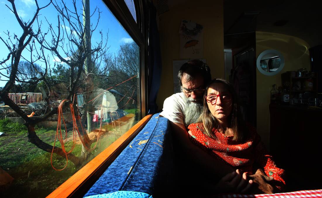 Murray Gibbs and Veronica Coen live in a bus beside the ruins of their Quaama home. Photo: Sylvia Liber 
