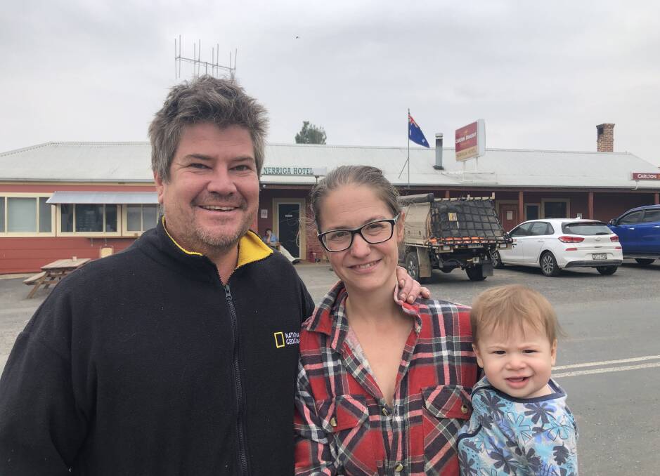 CHAMPIONS: Phil, Sarah and Oliver Smith outside the Nerriga Pub, which has become the defacto relief and recovery centre. Photo: John Hanscombe