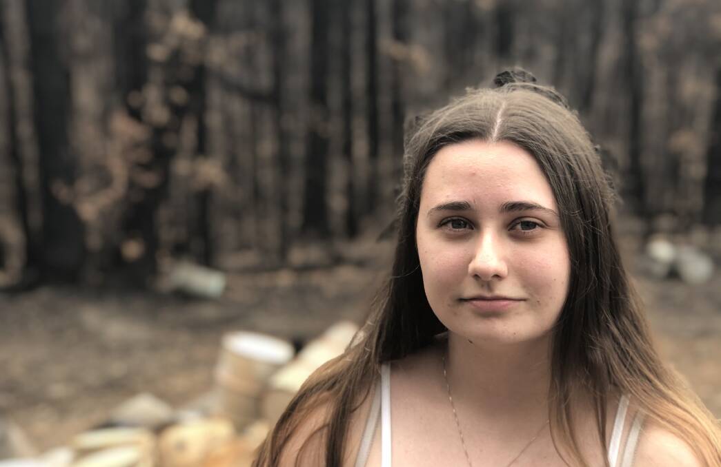 AT DAD'S SIDE: Rachel Ingold, who stayed to fight the fire with her father.