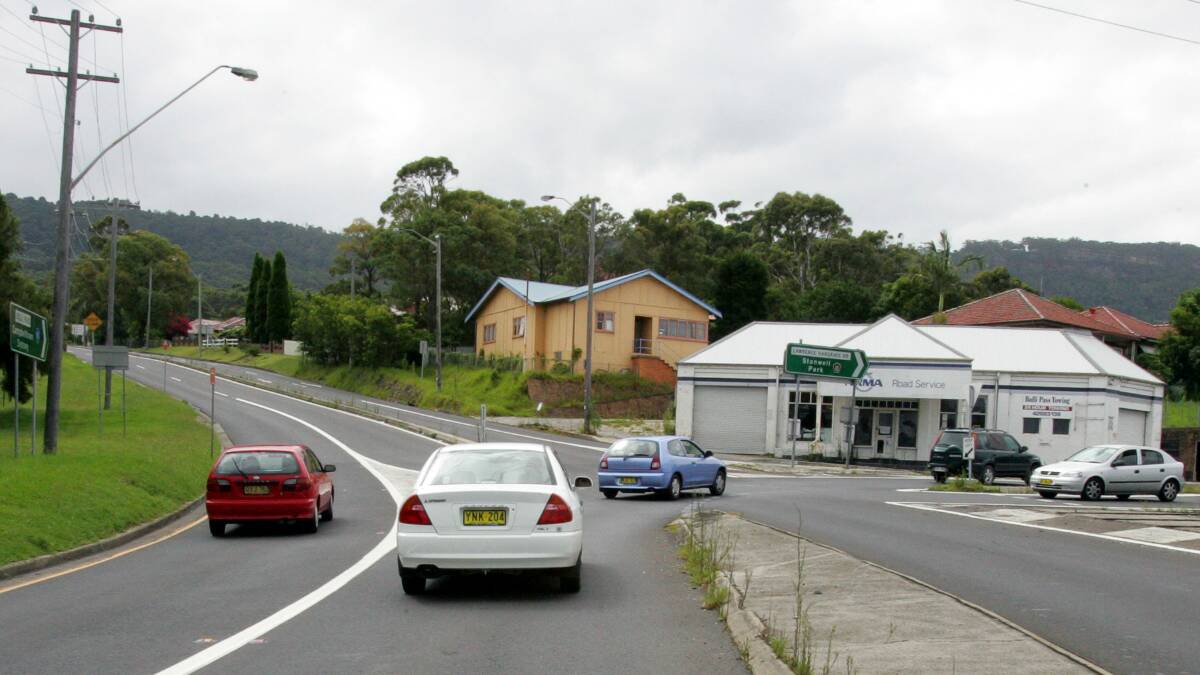 The Lawrence Hargrave Drive-Bulli Pass intersection in 2008 before construction started on the flyover. The NRMA service centre on the corner was one of the properties acquired for the construction. Picture by Kirk Gilmour.