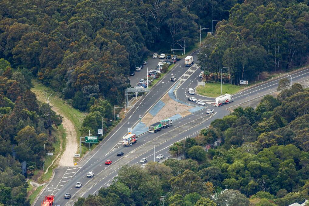 Upgrade: The intersection at the base of Mt Ousley that would be replaced by the approved Mt Ousley interchange. Picture: Adam McLean