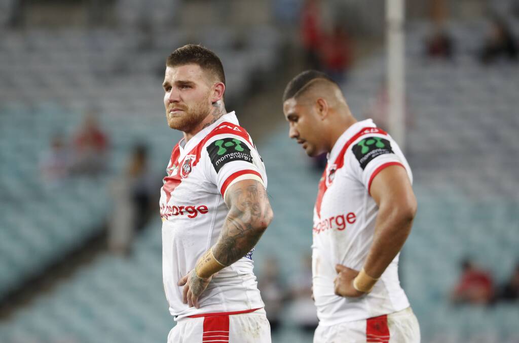 Josh Dugan and Nene McDonald after the loss to the Bulldogs on Sunday night, which ended the Dragons chances to make the finals. Picture: AAP