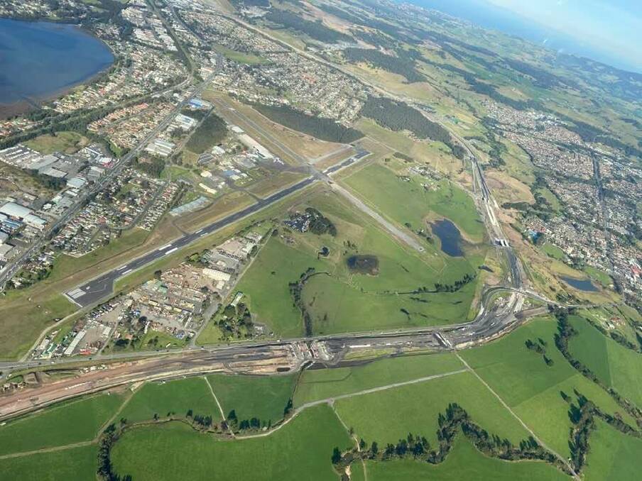 An aerial shot that shows the path of the Albion Park Rail bypass as it cuts around to the west of Shellharbour Airport before heading east towards the Oak Flats interchange. Picture: Max Cochrane