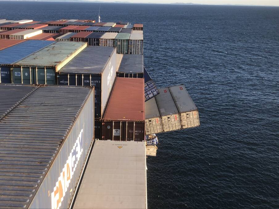 Spillage: Some of the containers that almost fell off the APL England - 50 did fall into the water and fines have been levied over the incident. Picture: supplied