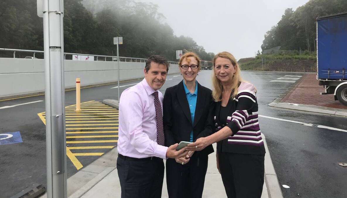 Call up: Keira MP Ryan Park,Telstra's Ann Jakle and Cunningham MP Sharon Bird check out the improved mobile phone reception along Picton Road. Picture: supplied
