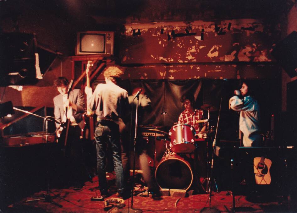 Indie: The Lighthouse Keepers onstage at one of a number of Sydney hotels - note the TV set on the wall behind them. Picture: Greg Appel collection