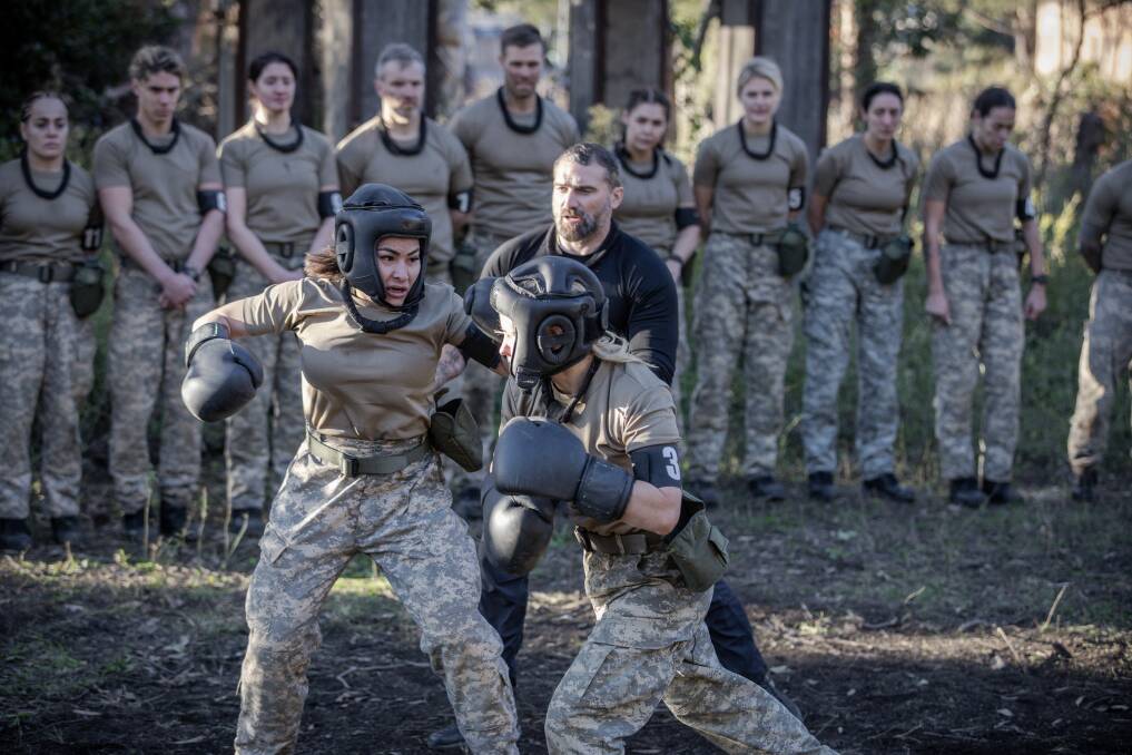 Challenge: Albion Park's Lisa Trujillo (left) getting put through her paces on the millitary-style course on SAS Australia: Hell Week. Pictures: Seven