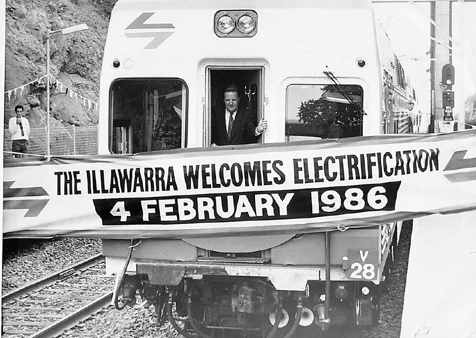 NSW Transport Minister Barrie Unsworth rides the first electric train into Wollongong in 1986.