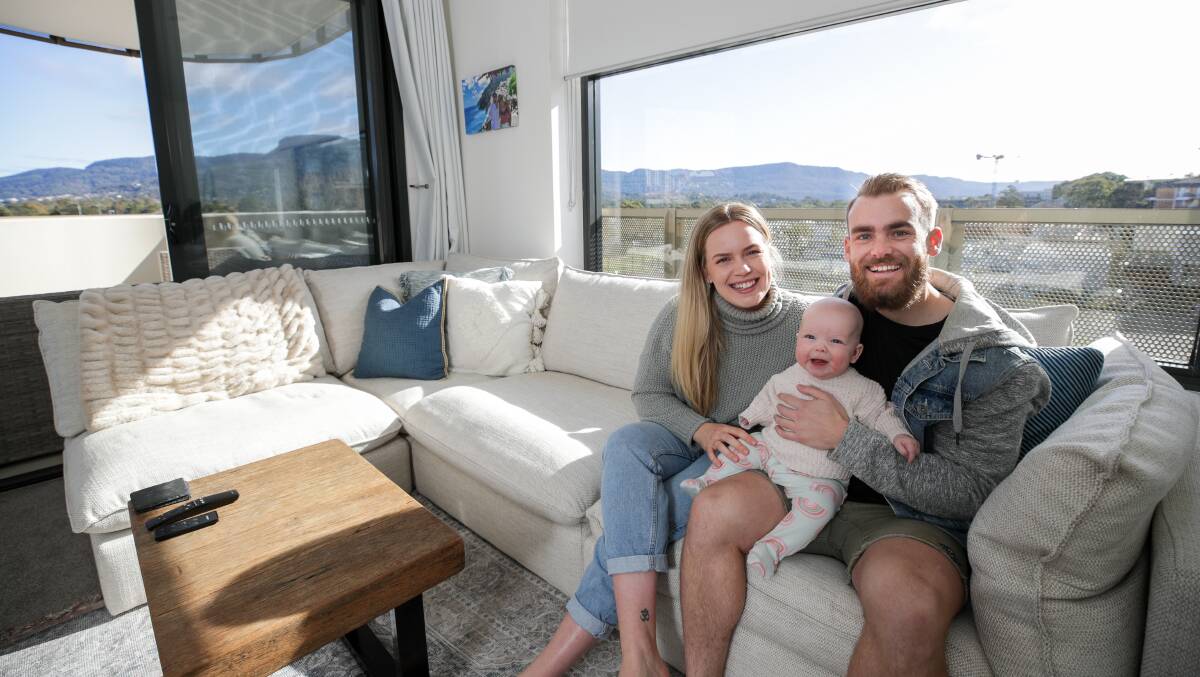 High life: Chloe Golding and Andrew Hodgen - with daughter Isla - are among the increasing number of people who have opted for inner-city living rather than a block in the burbs. Picture: Adam McLean
