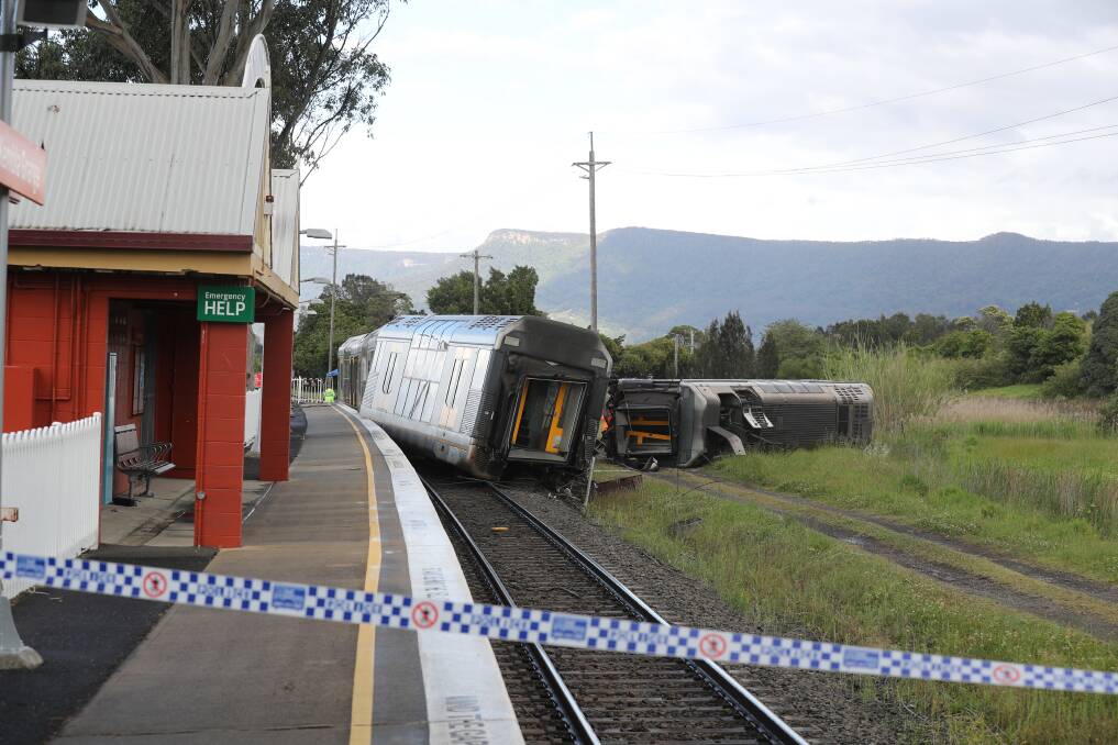 Repairs: The train derailment at Kembla Grange on Wednesday will see the section of the South Coast line closed for days.Picture: Robert Peet