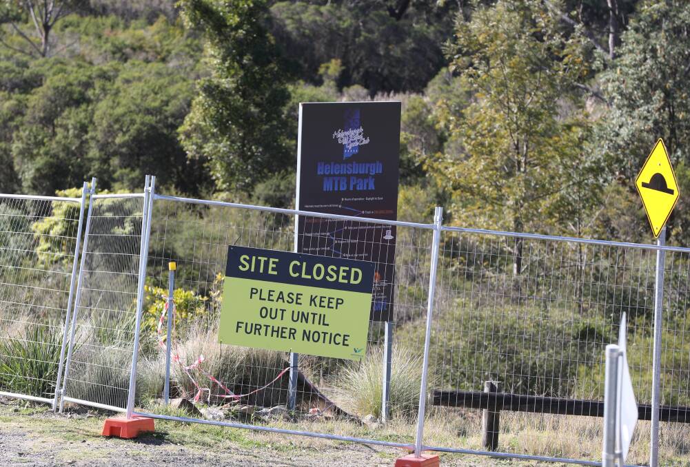 The "site closed" signs up at the Helensburgh Mountain Bike Track are because of the discovery of asbestos. Picture by Robert Peet