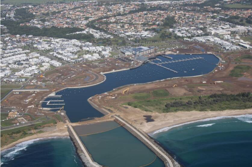 An aerial shot of the Shell Cove marina, with the sand plug in the foreground. Picture:supplied