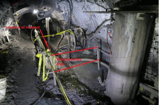 The two red lines show the location where a safety barrier should have been located. The Resources Regulator found that had not been replaced after a new scraping conveyor was installed. Picture: Resources Regulator