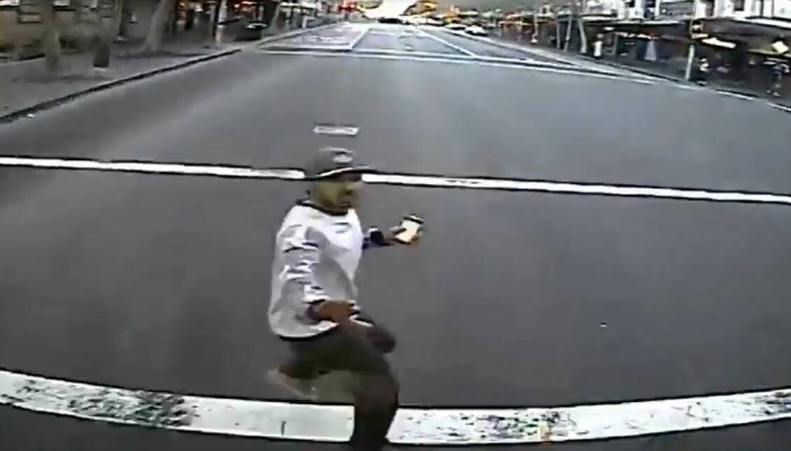 A video still from a bus camera showing the second before hitting a pedestrian who walked out into the street without looking. Picture: Transport for NSW