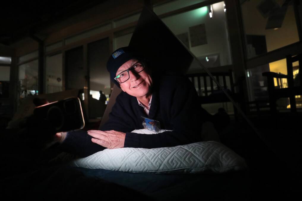 Chilly: Flagstaff CEO Roy Rogers prepares to bed down in the cold at Thursday night's CEO Sleepout in Coniston. Picture: Robert Peet