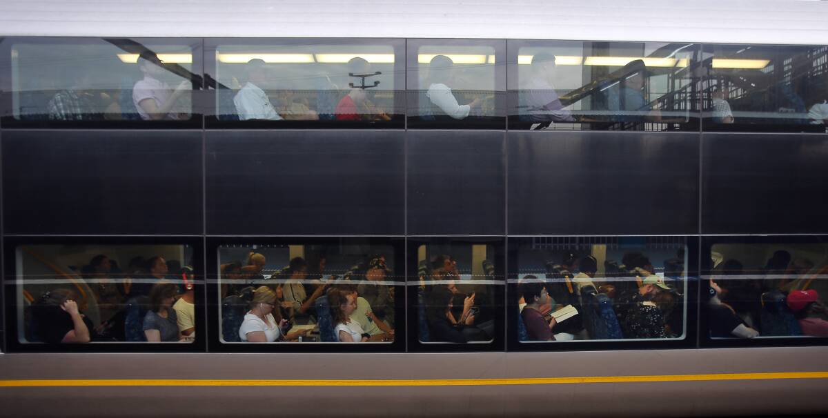 Long trip: Illawarra rail commuters travelling to Sydney have only seen slight improvements in travel time in the last 10 years, according to Wollongong MP Paul Scully. Picture: Robert Peet