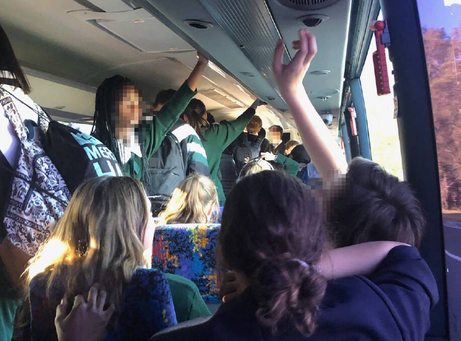 Stand up: A photo taken by an Illawarra Christian School student on a Premier Illawarra school bus, which a parent claims has too many children standing.