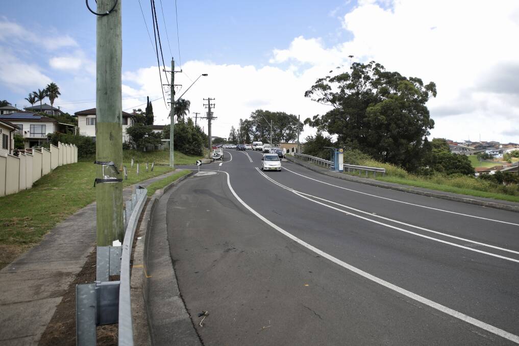 A motorcyclist in his 20s crashed into this power pole on Lake Avenue, Cringila, on Sunday morning. Picture: Adam McLean