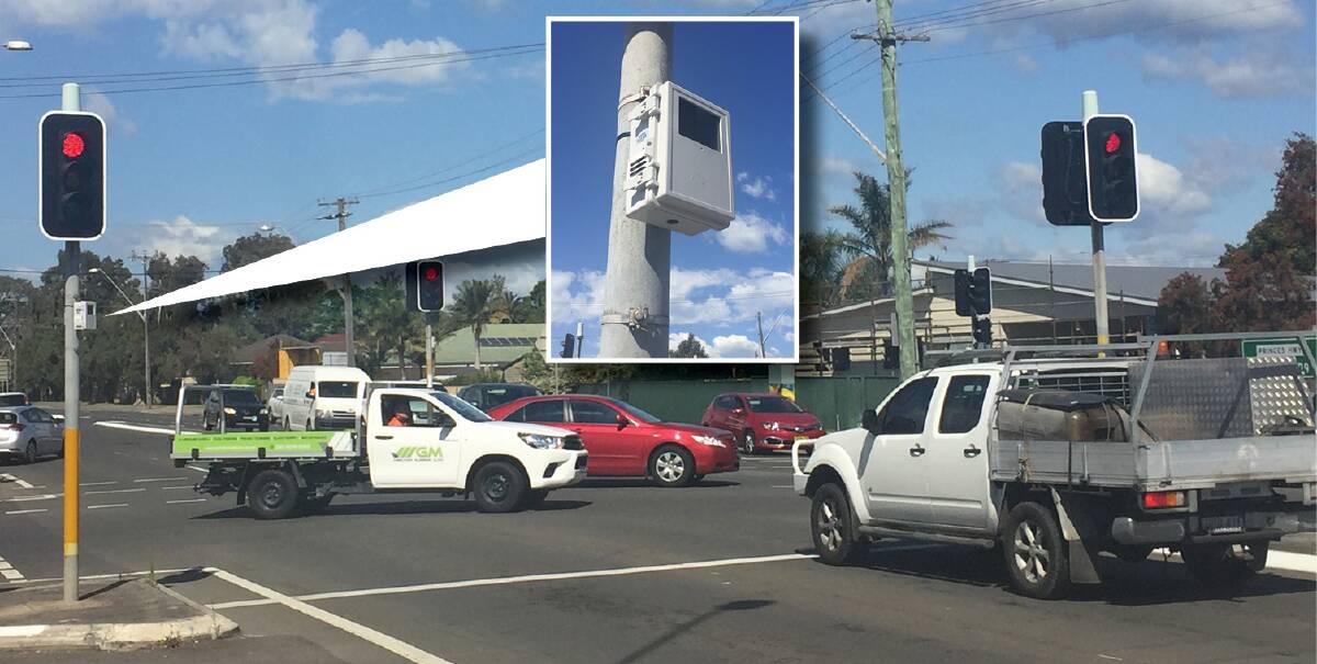 Gotcha!: Small white boxes - like this one at the intersection of Five Islands Road and the Princes Highway at Unanderra - have people worried, thinking they are detecting drivers using mobile phones. Pictures: Glen Humphries
