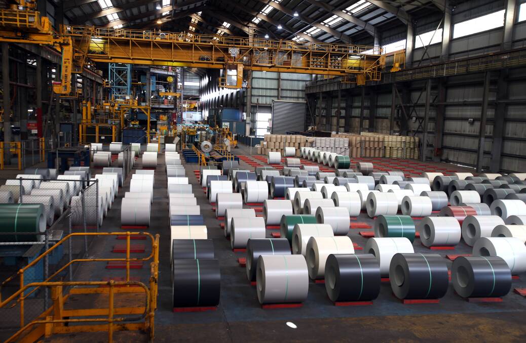 Steel coils lined up at BlueScope's Springhill plant - the steelmaker has recorded a record profit. Picture: Sylvia Liber