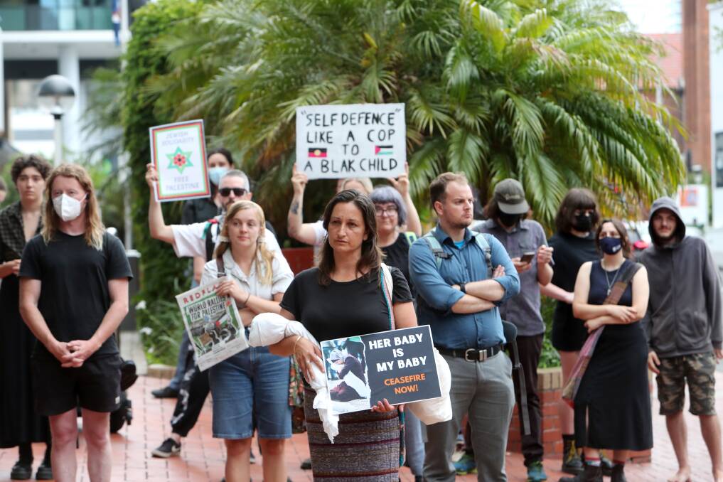 Protesters outside the Wollongong City Council building before the previous council meeting. Picture by Sylvia Liber