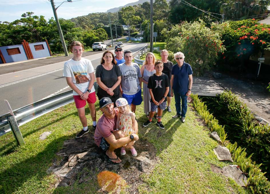 Lorraine Lang (fourth from right) with other residents who live on a stretch of Lawrence Hargrave Drive that she said sees a lot of speeding drivers. Picture: Adam McLean