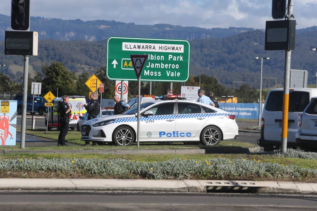 Police on the scene at Albion Park Rail after a car chase. A man linked to the chase - and to Monday's carjacking at Gerringong - will appear in court on Wednesday. Picture: Robert Peet