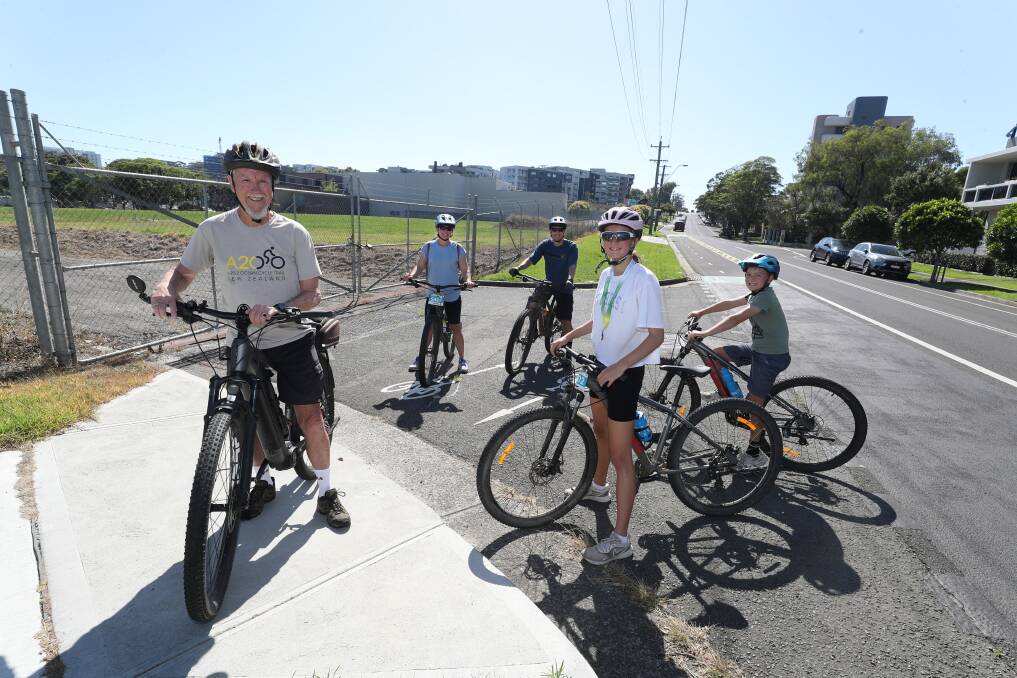 Paul Taylor, Claire Carter, Robert, Allegra and Dante Beretov at the Smith Street pop-up cycleway. Picture by Robert Peet