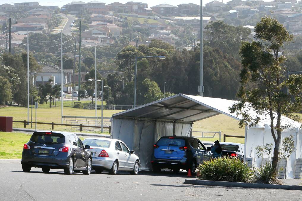 File image: Cars queueing up at the Shellharbour drive-through COVID testing centre. Picture: Sylvia Liber