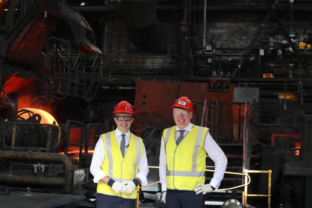 Millions: Energy Minister Matt Kean with Kiama MP Gareth Ward at BlueScope to announce "the biggest single investment" in carbon reduction in NSW. Picture: Robert Peet