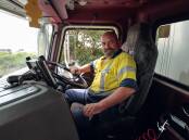 Truck driver Tony Reh took a Mercury journalist on a ride down Mt Ousley Road so they could see what some car drivers do. Picture by Christopher Chan