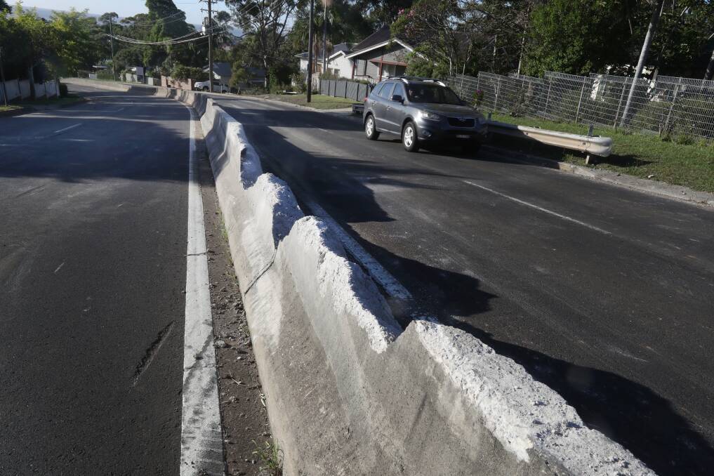 The battered concrete median barrier after the 2019 truck rollover. Picture by Robert Peet