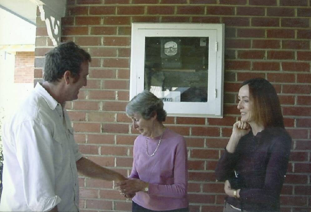 Jim meeting his birth mother Anne in Goulburn in 2003 - his newfound sister Janet is to the right. Picture by Suzy Flowers