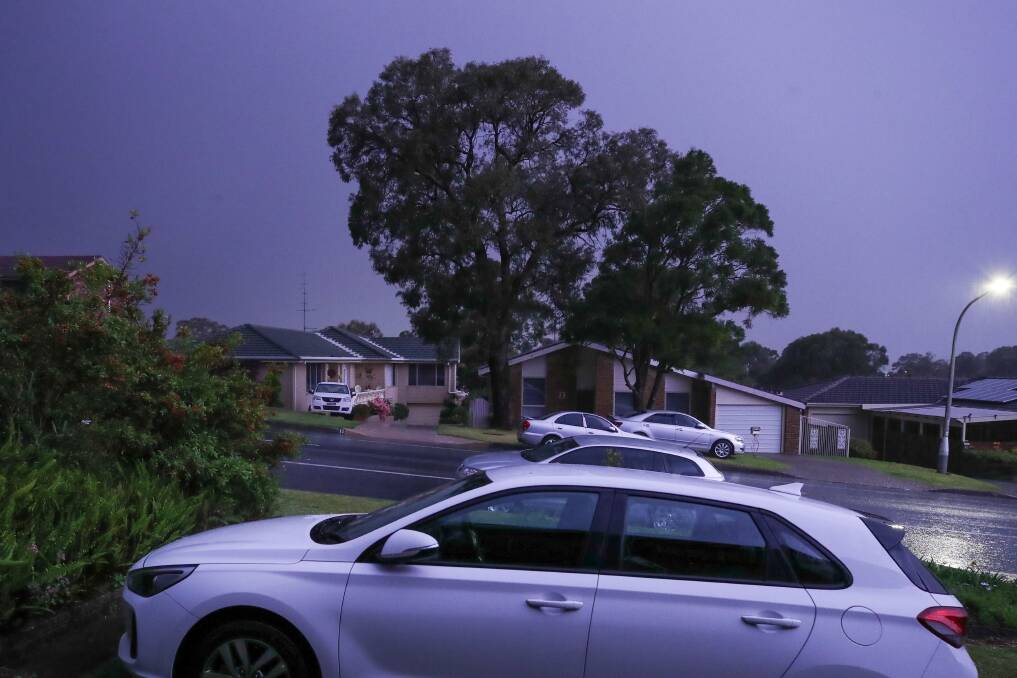 Storm: Grey skies over the Illawarra at around 4am on Friday brought with them lightening, thunder and rain. Picture: Adam McLean