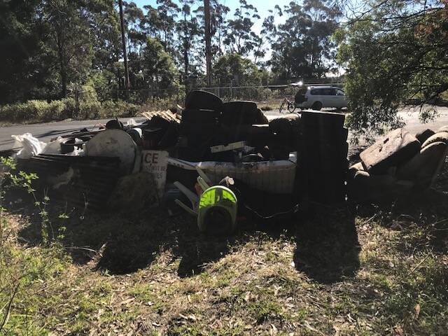 Tyred: More than a dozen tyres were found in the bush at Mt Keira on Saturday morning.