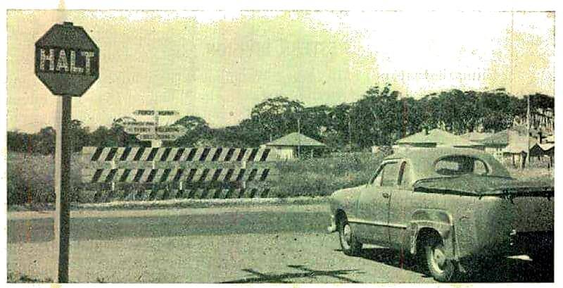 The "halt" sign at the Fairy Meadow intersection back in the 1960s, with paddocks visible on the eastern side. Picture: Lost Wollongong