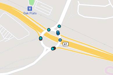 The crash cluster at the Oak Flats interchange, with the blue dots marking accidents resulting in moderate and severe injuries.
