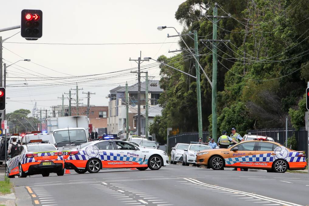 Lockdown: A Fairy Meadow man sparked a three-hour siege that led to police closing the Princes Highway and also affected a nearby school. Picture: Adam McLean