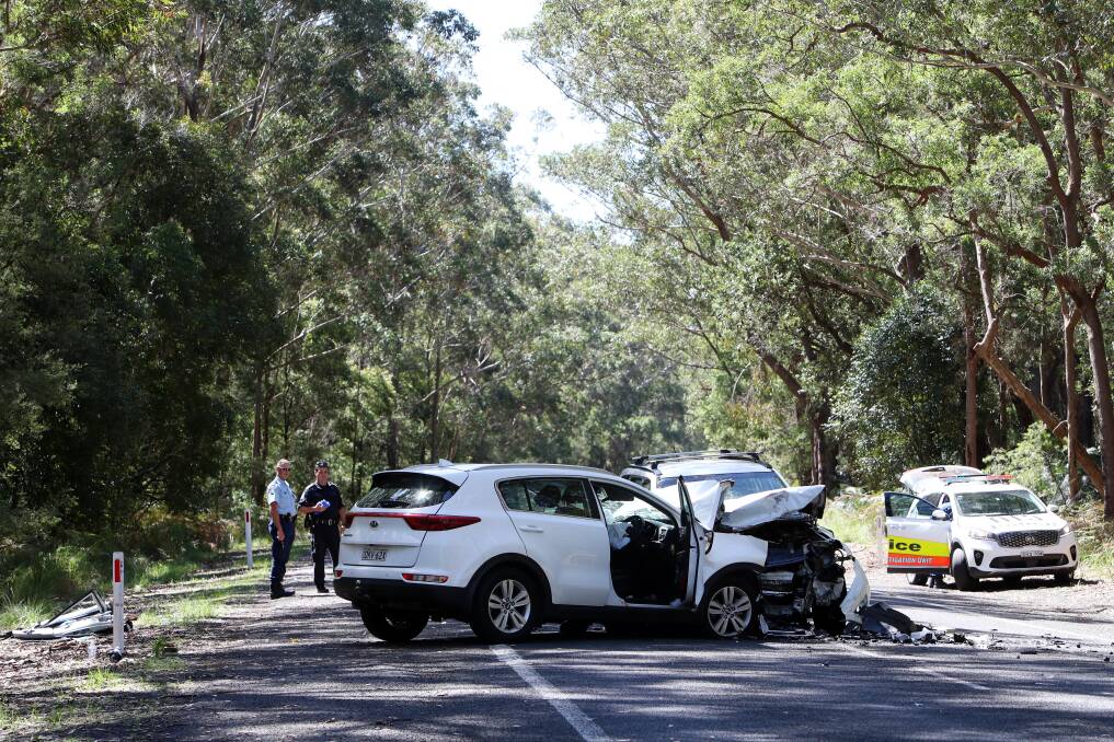Tragic: The aftermath of a head-on collision on Gerroa Road on Tuesday where one woman died at the scene. It's a road that has seen a number of other serious accidents. Picture: Sylvia Liber