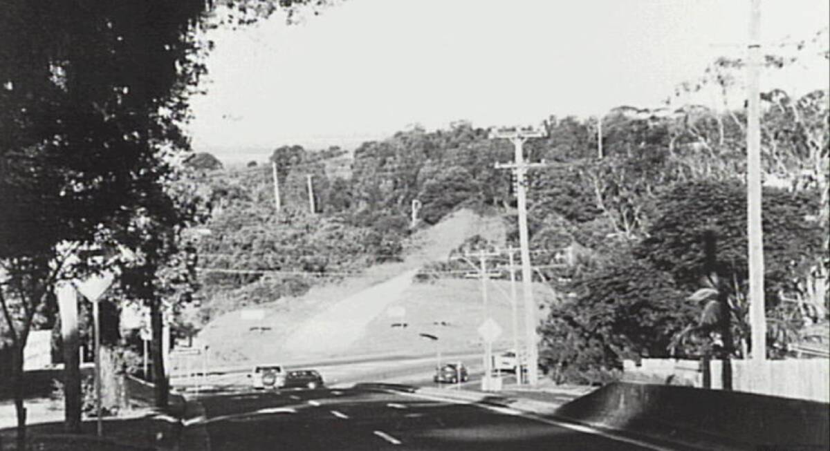 A photo showing the safety ramp through the trees that once existed at the base of Bulli Pass. Picture from Wollongong City Libraries.