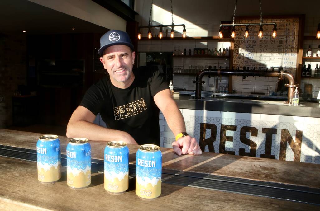 Surprise: Resin Brewing's Brendan Dowd with the special gold-topped cans that will be hidden among the brewery's mixed four-packs. Picture: Sylvia Liber