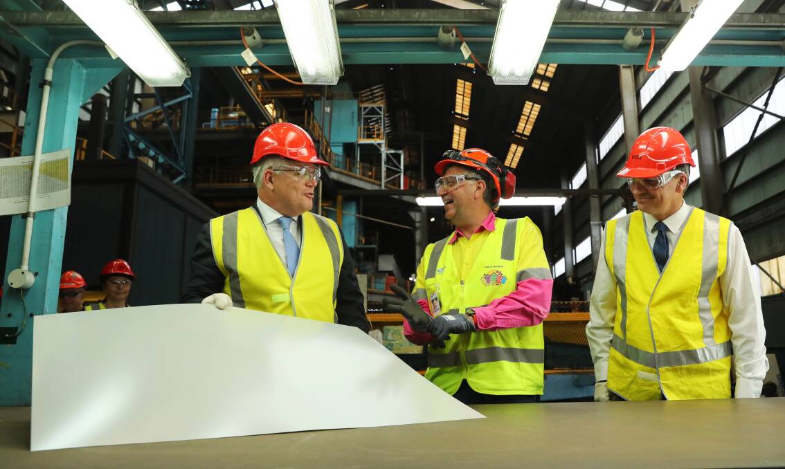 Tour: Prime Minister Scott Morrison and Energy and Emissions Reduction Minister Angus Taylor with BlueScope manager Gary Meta on Thursday. Picture: supplied