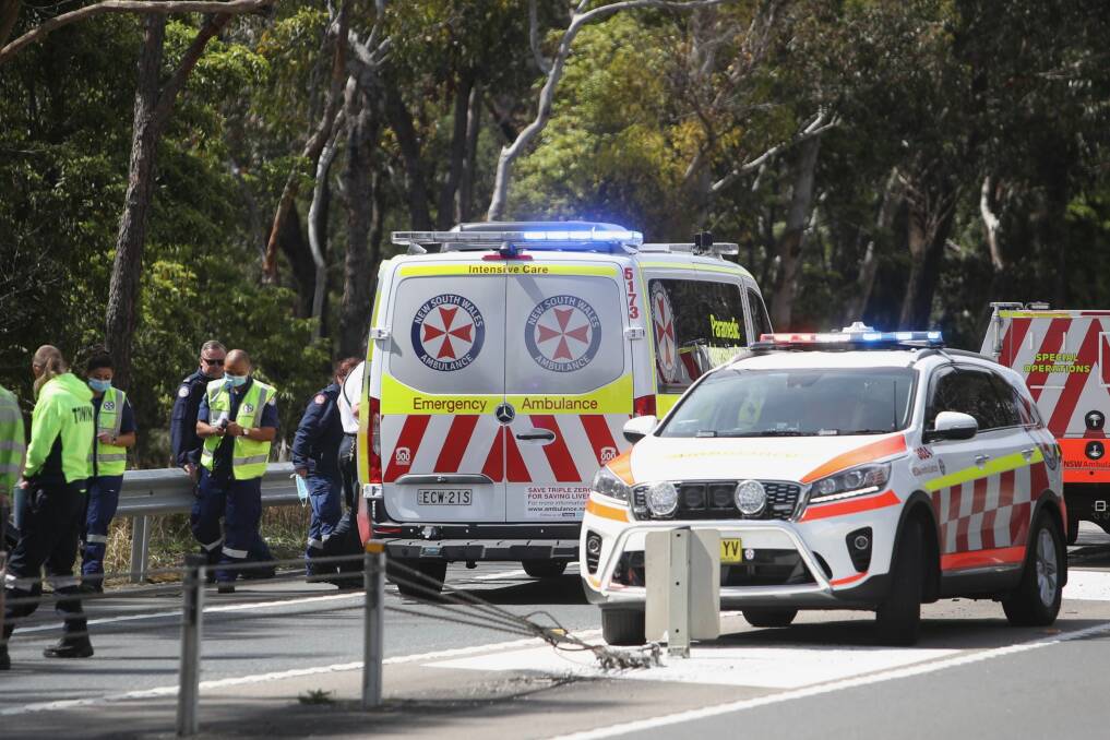 Police and ambulance at Picton Road, near the intersection of Mt Keira Road where a motorcyclist has come off his bike. Picture: Glen Humphries