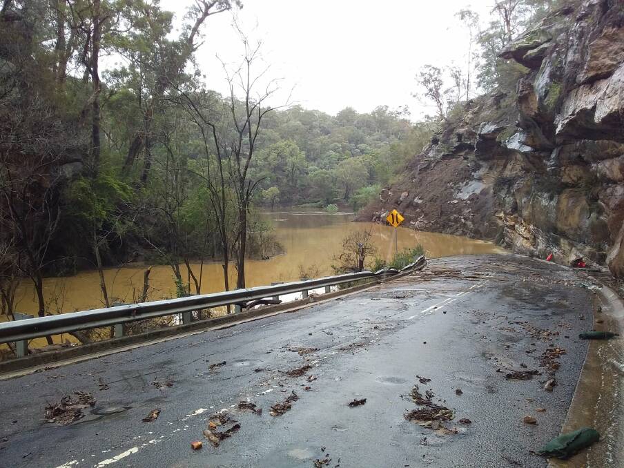 Damage: The section of Douglas Park Drive in the Wollondilly shire disappeared under the overflowing Nepean River. Picture: Wollondilly Shire Council