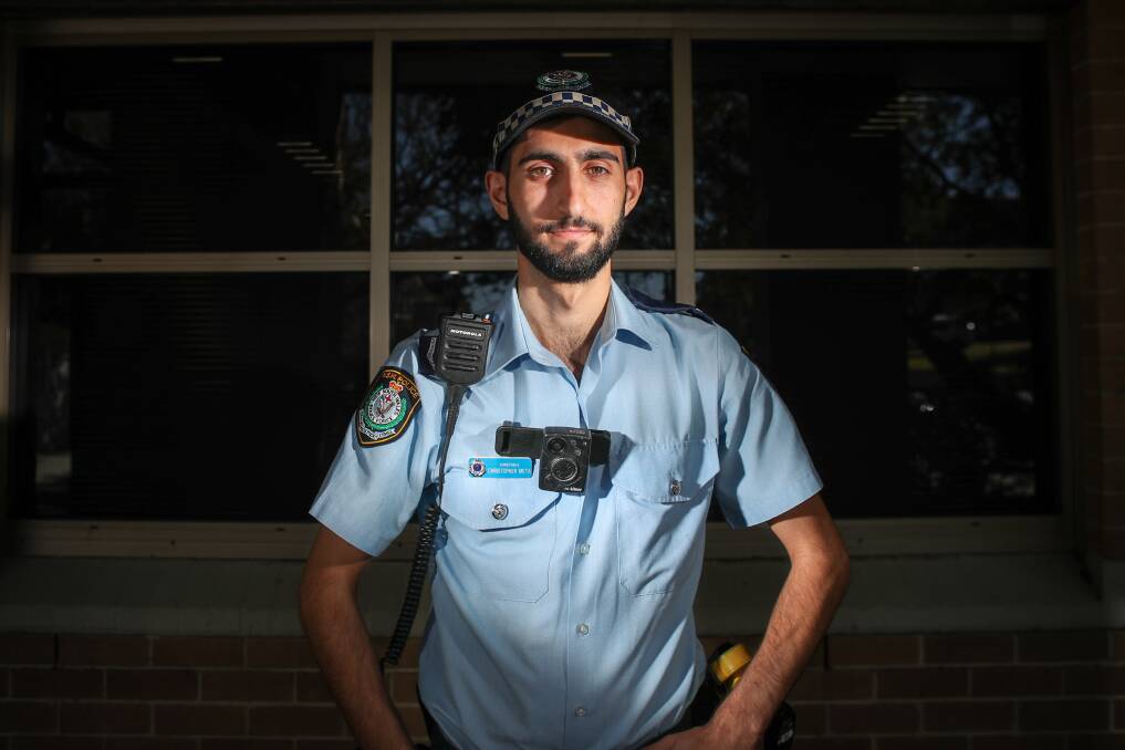 Camera crew: Wollongong police officer Constable Christopher Meta with the new body camera that have been rolled out to Wollongong police. Picture: Adam McLean