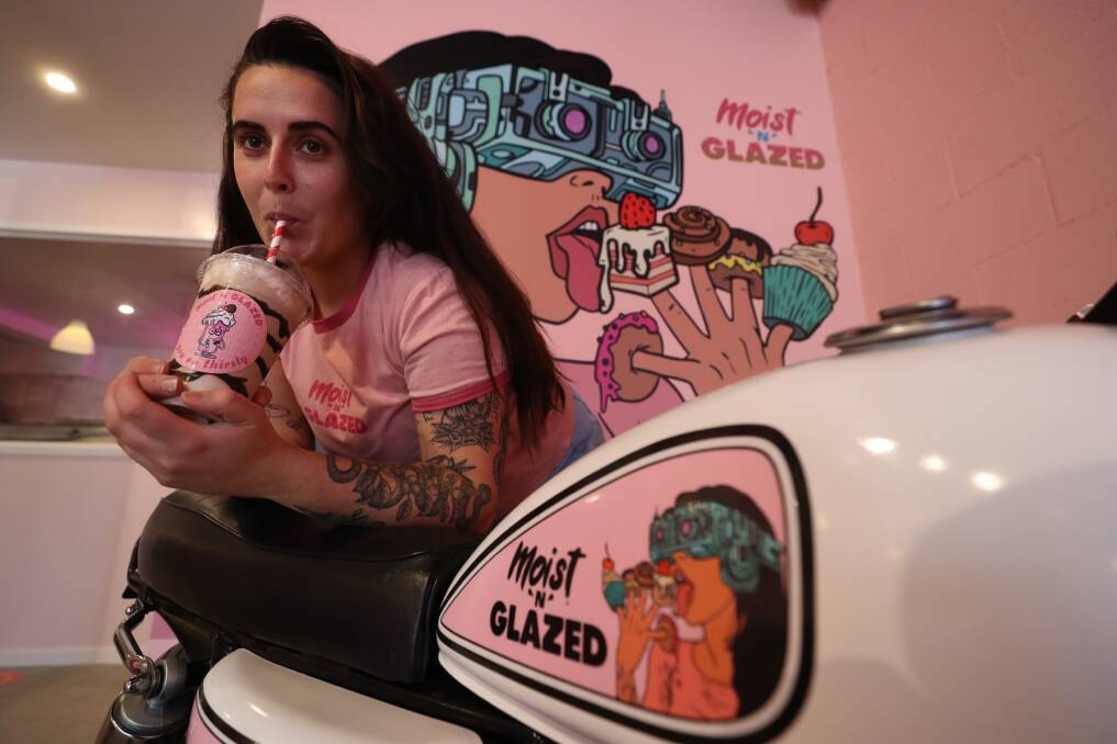 Popular: Kiama's Moist 'N' Glazed donut shop owner Ash Camilleri said she had a queue of people down the street for her opening day on Saturday. Picture: Robert Peet