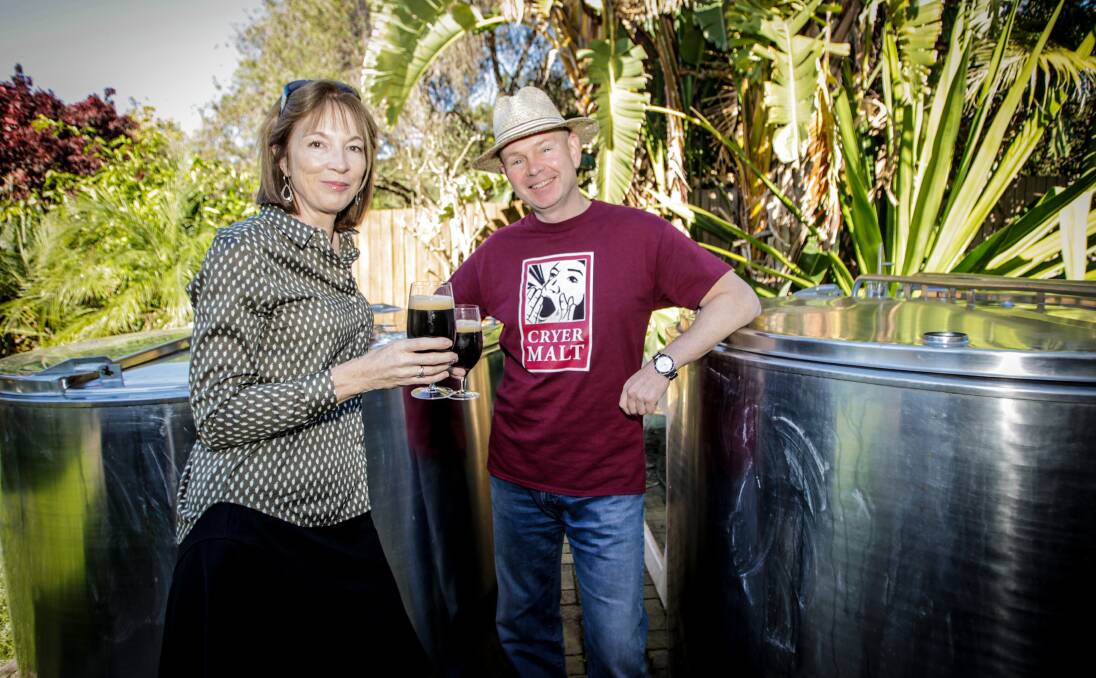 Here's cheers: Michael Peloquin, with wife Sally toast to the health of their new brewery, Bulli Brewing, which is set to open by the end of this year. Picture: Georgia Matts