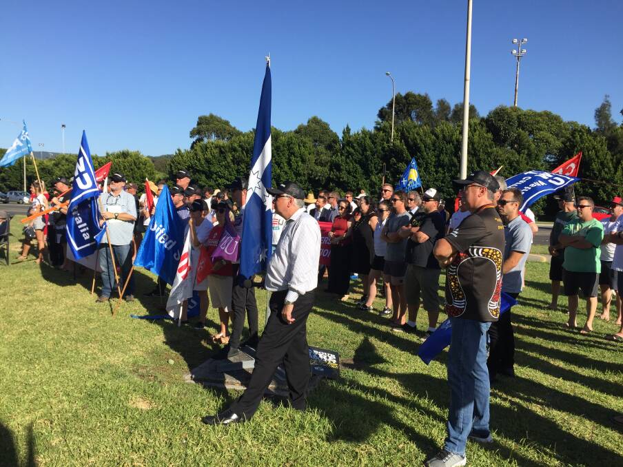 International friends: Unionists at the Port Kembla Coal Terminal picket line during Tuesday morning's live video link to supporting workers in Canada.